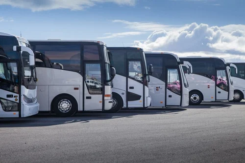 What is a coach bus, and how does it differ from other types of buses